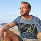 'Last Light' - Denim blue organic cotton surf t-shirt – Modelled by local surfer JB at Fistral beach in Newquay, Cornwall.