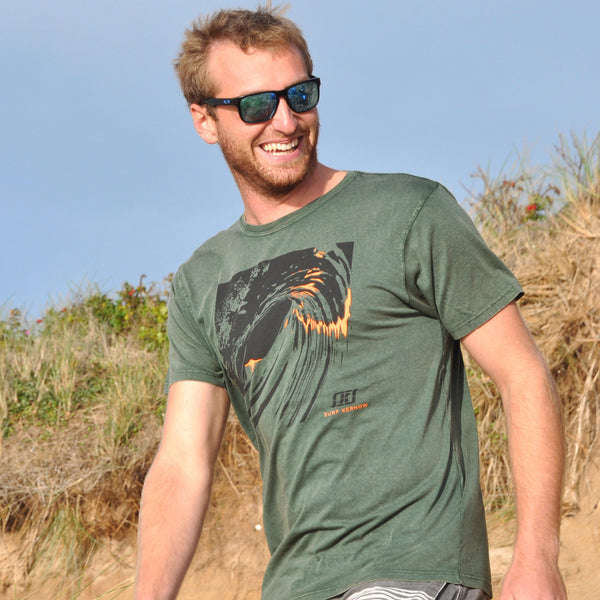 'Last Light' - Stonewashed green organic cotton surf t-shirt – Modelled by local surfer JB at Fistral beach in Newquay, Cornwall.