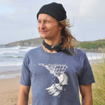 'Carve' - Denim blue organic cotton surf t-shirt – Modelled by local surfer René at Fistral beach in Newquay, Cornwall.